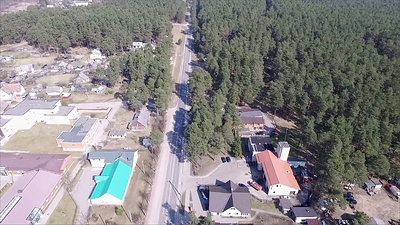 Flight Over Small Town Near Forest 2