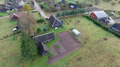 Flight Around Houses In Country