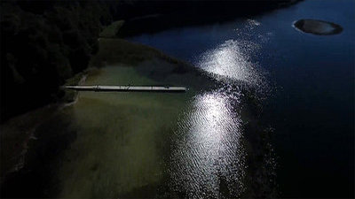 Flight Over The Small Bridge On The Lake Near Forest At Evening Night